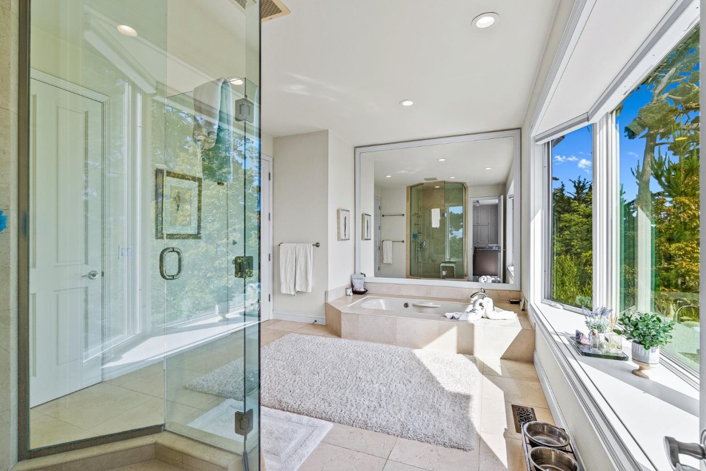 4038 Sunridge Road Pebble Beach, CA 93953 - Photo 23 of 48 a living room with furniture and a large window