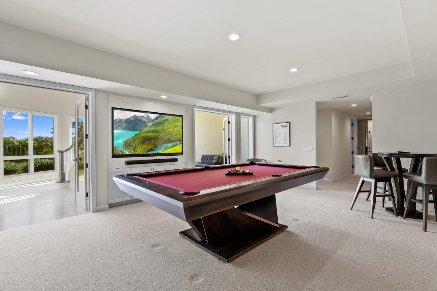 4038 Sunridge Road Pebble Beach, CA 93953 - Photo 26 of 48 a room with pool table and windows