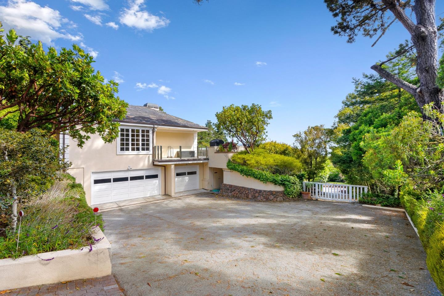 4038 Sunridge Road Pebble Beach, CA 93953 - Photo 34 of 48 a view of a backyard with a garden and plants