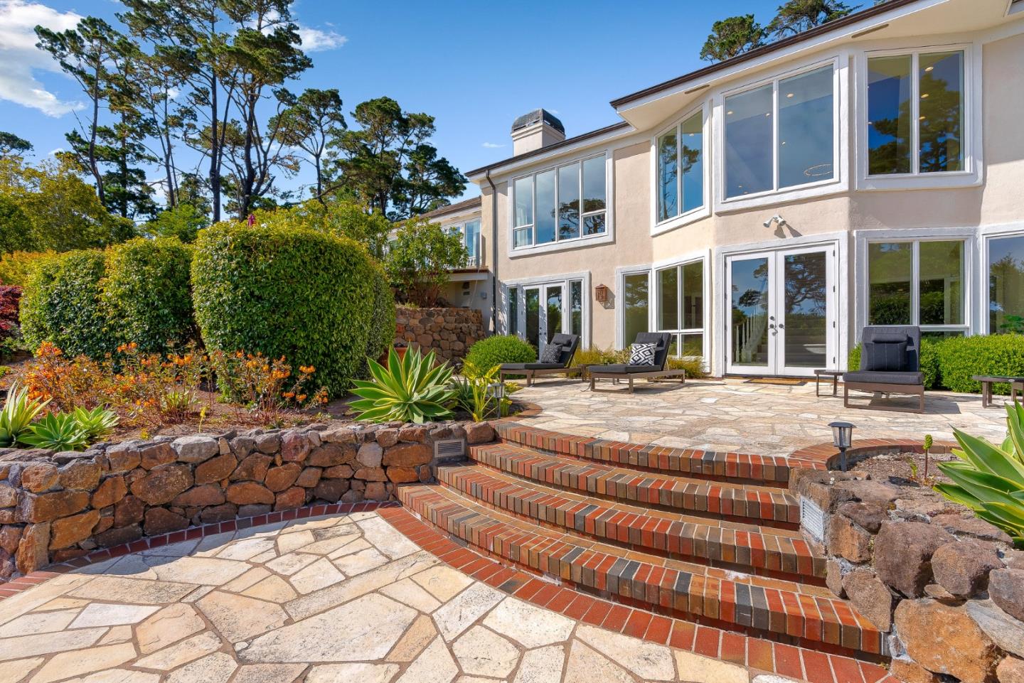 4038 Sunridge Road Pebble Beach, CA 93953 - Photo 40 of 48 a view of a building with sitting area