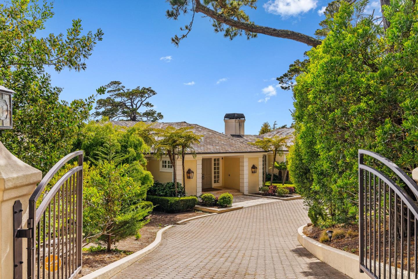 4038 Sunridge Road Pebble Beach, CA 93953 - Photo 5 of 48 a view of a house with a flower garden