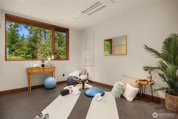 a living room with furniture and a window