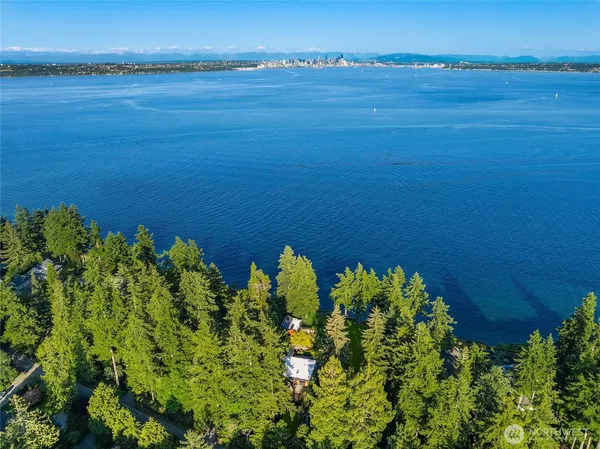 a view of a lake and a yard