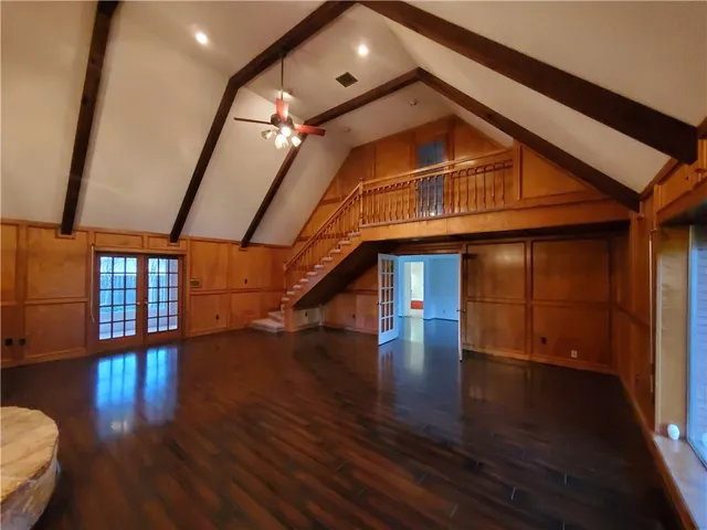 a view of entryway with wooden floor