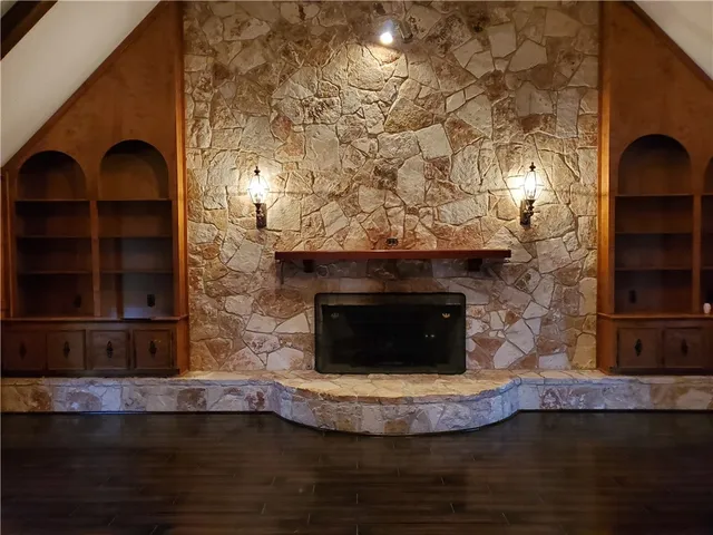 a living room with a fireplace