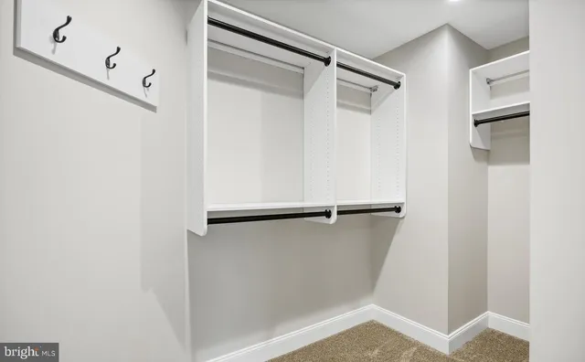 a view of an empty walk in closet