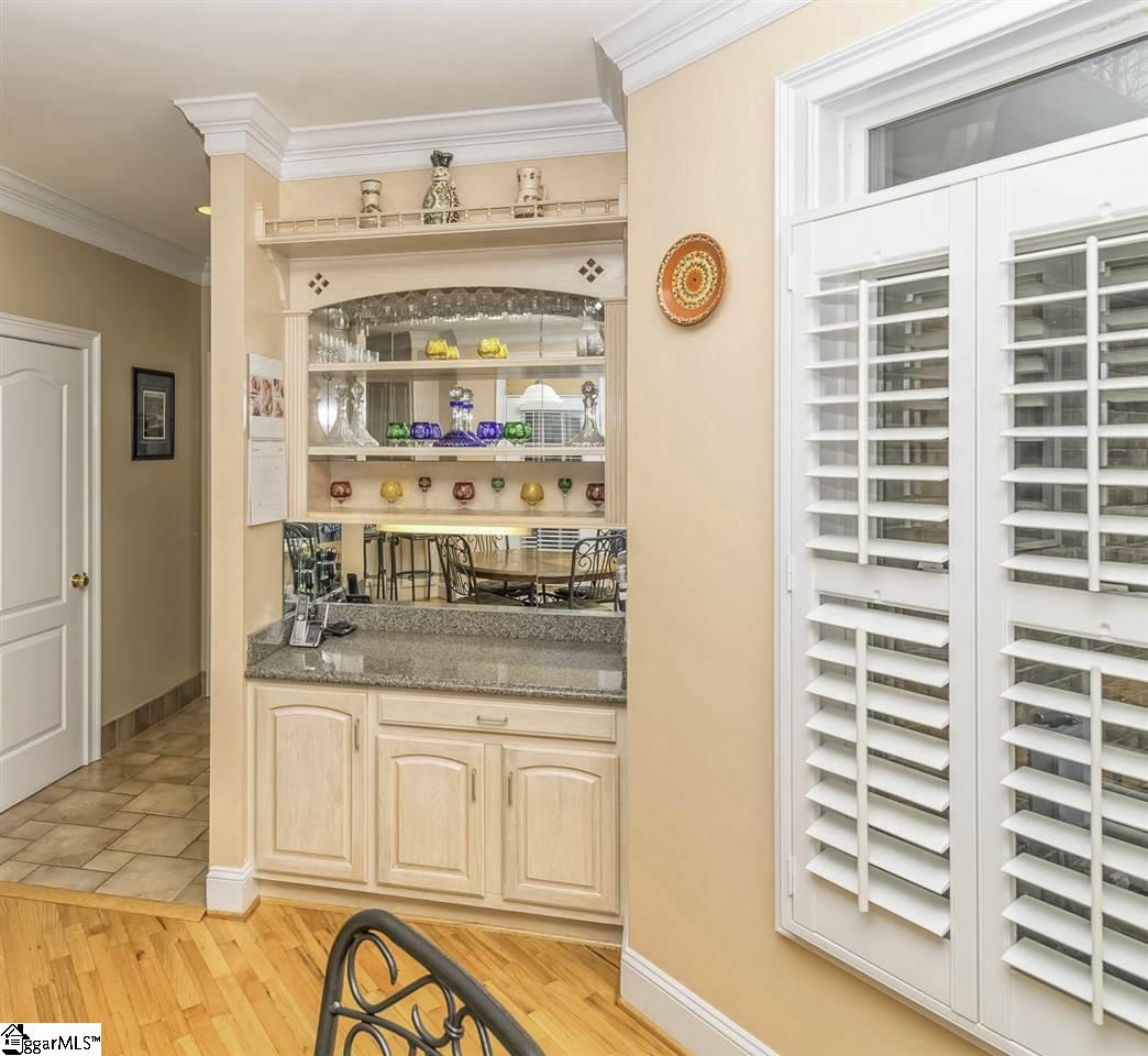 220 Block House Road Greenville, SC 29615 - Photo 15 of 36 Built-in Bar in Breakfast Area with Shelving, Lighting and Storage