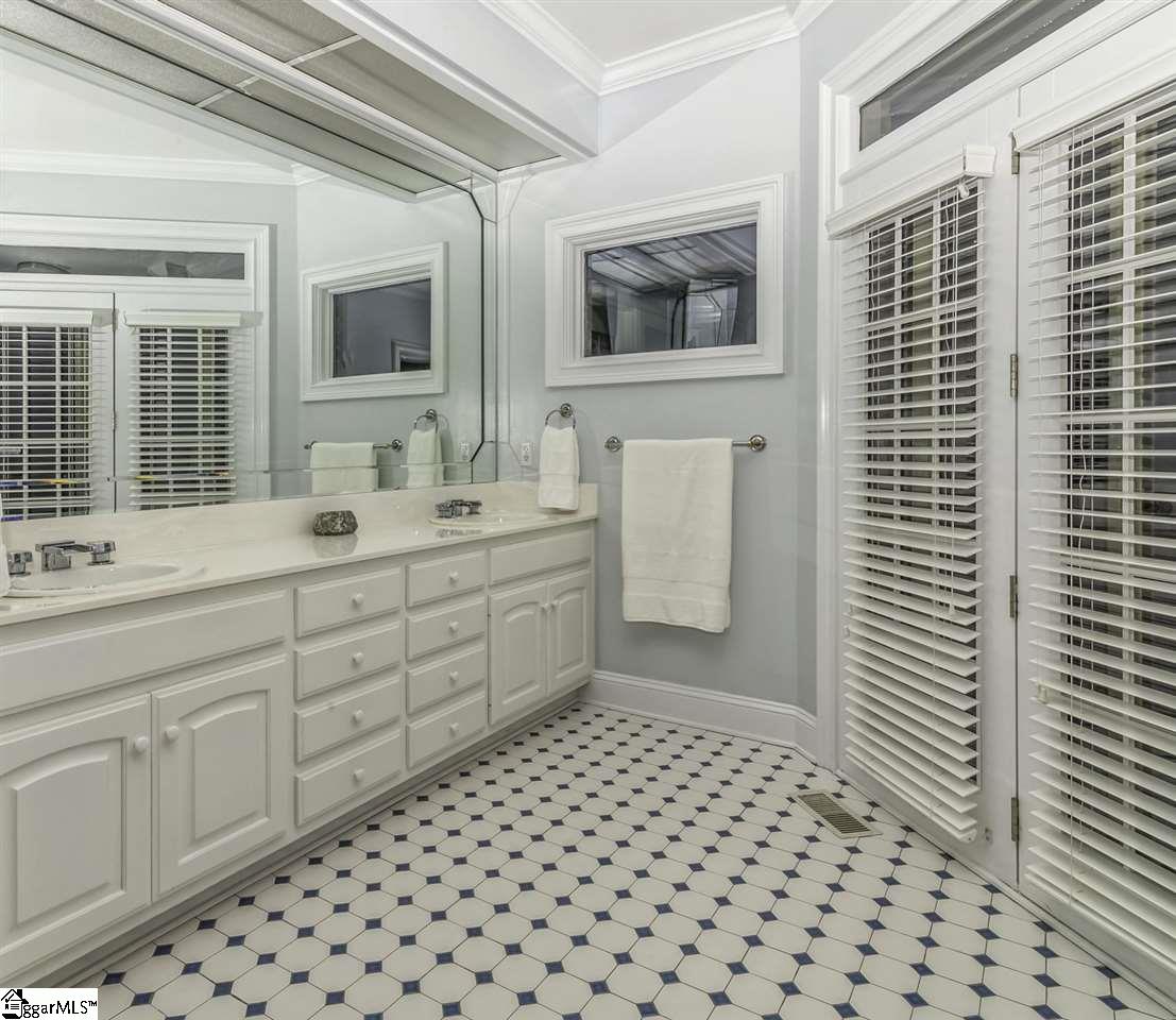 220 Block House Road Greenville, SC 29615 - Photo 20 of 36 Master Bathroom with Multiple Windows, French Doors, Open Shelving, Dual Sinks and Two Walk-In Closets