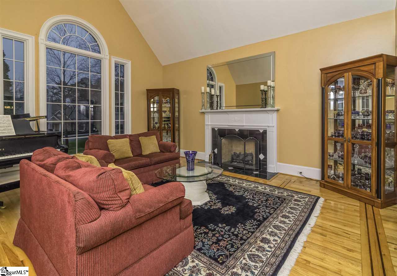 220 Block House Road Greenville, SC 29615 - Photo 7 of 36 Living Room with Cathedral Ceiling, Gorgeous Windows and Gas-Log Fireplace