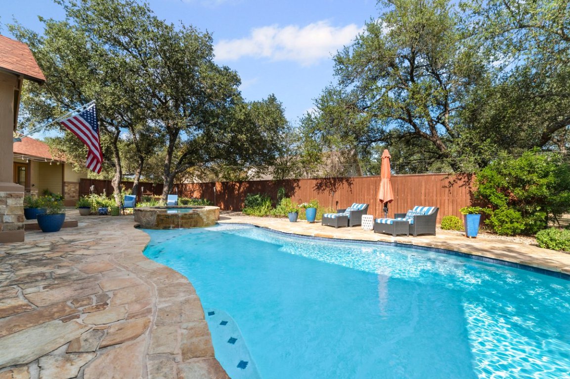 139 Ware Drive Buda, TX 78610 - Photo 36 of 40 a view of a house with a yard