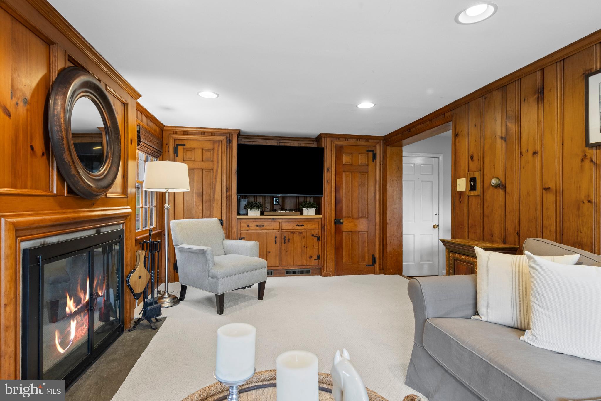 421 St Davids Road Wayne, PA 19087 - Photo 20 of 39 a living room with furniture and a fireplace