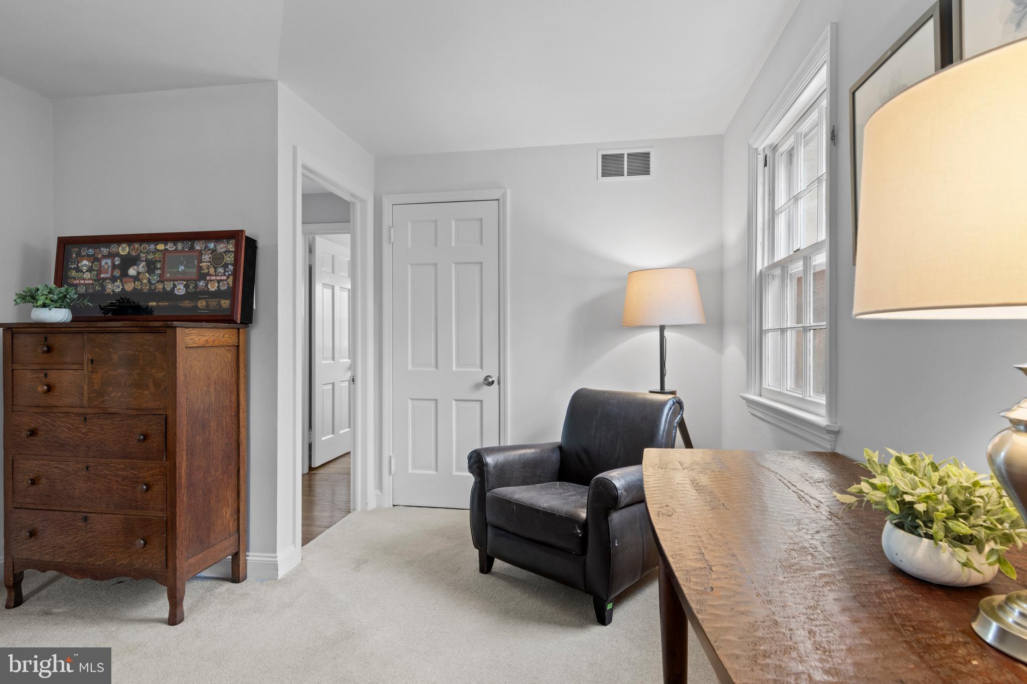 421 St Davids Road Wayne, PA 19087 - Photo 30 of 39 a living room with furniture and a window