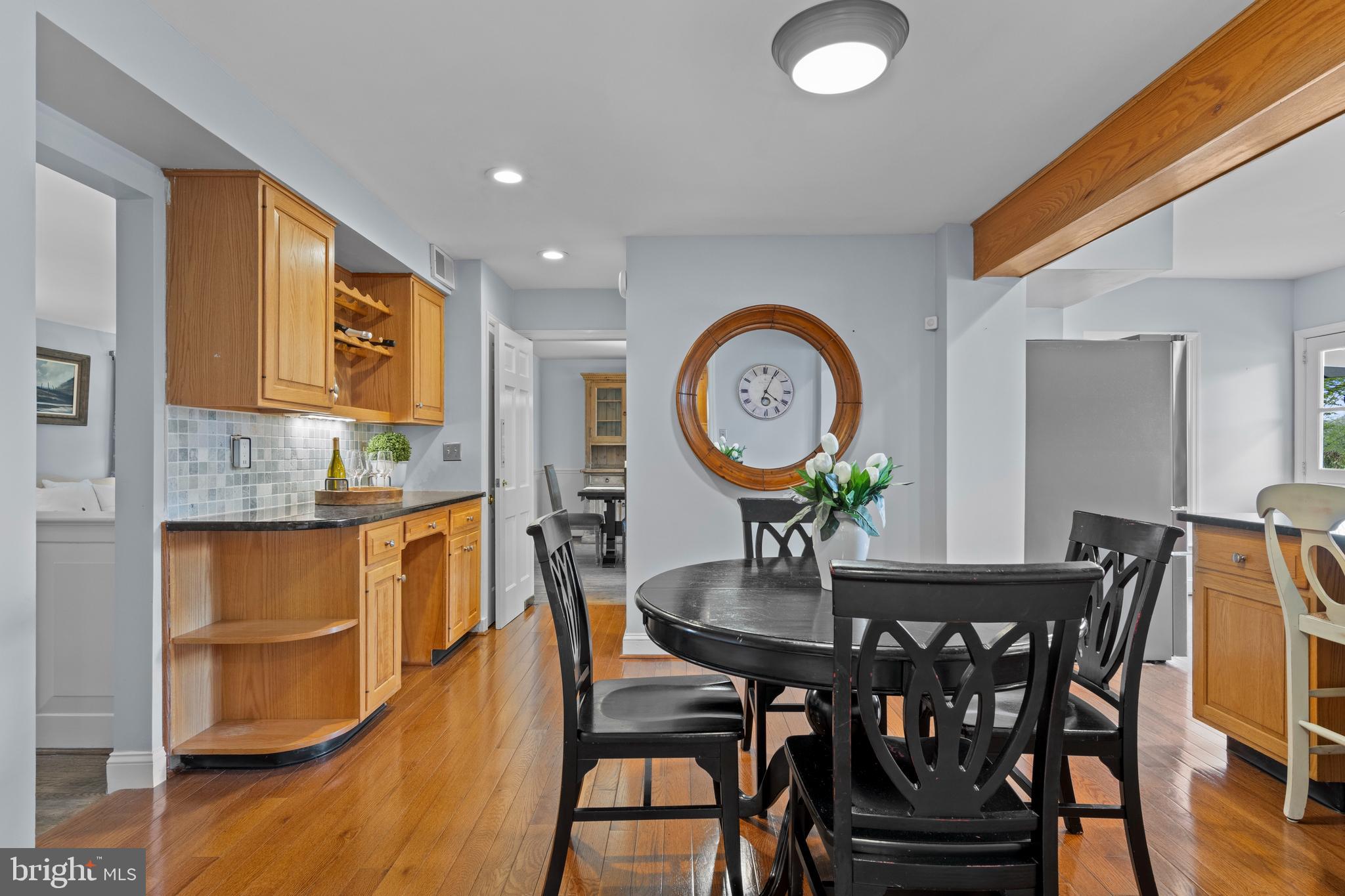 421 St Davids Road Wayne, PA 19087 - Photo 10 of 39 a view of a dining room with furniture and wooden floor