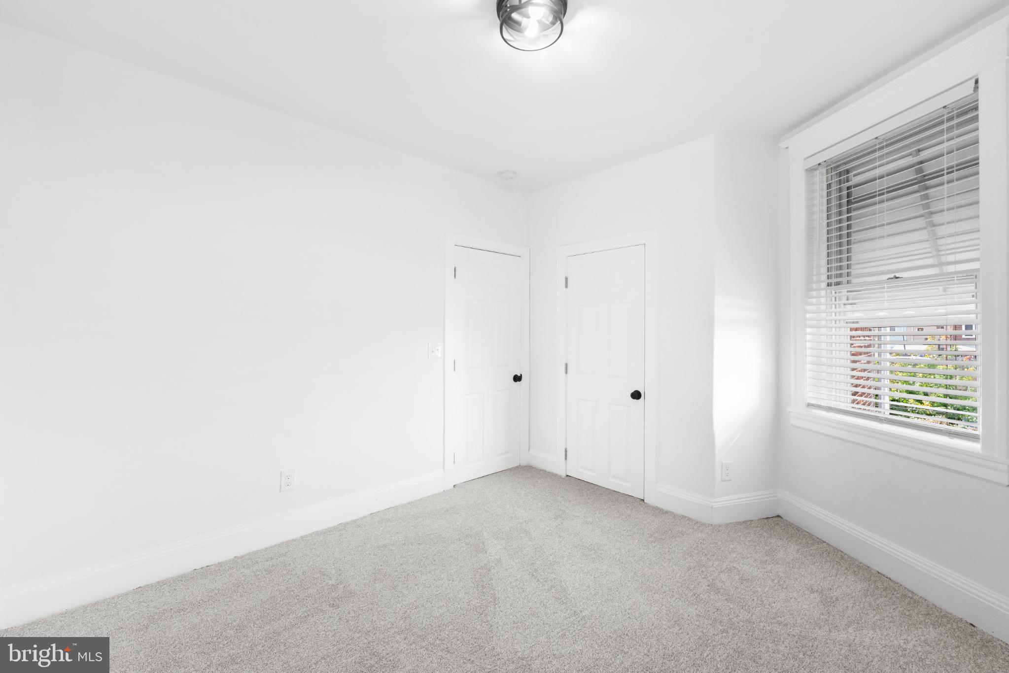 2508 East Indiana Avenue Philadelphia, PA 19134 - Photo 22 of 37 a view of an empty room with windows