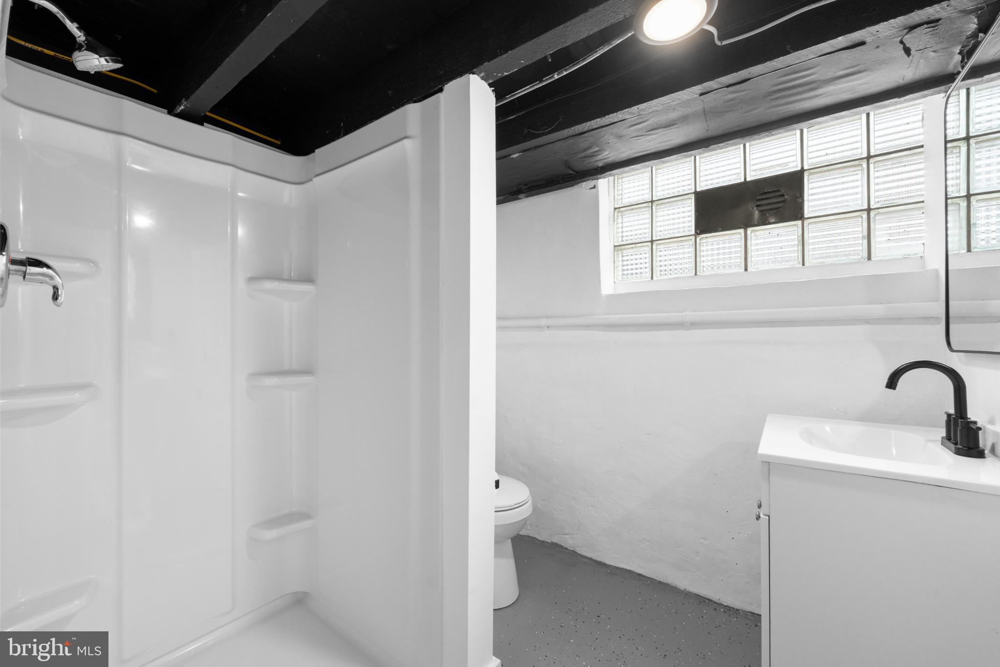 2508 East Indiana Avenue Philadelphia, PA 19134 - Photo 28 of 37 a bathroom with a toilet sink and shower