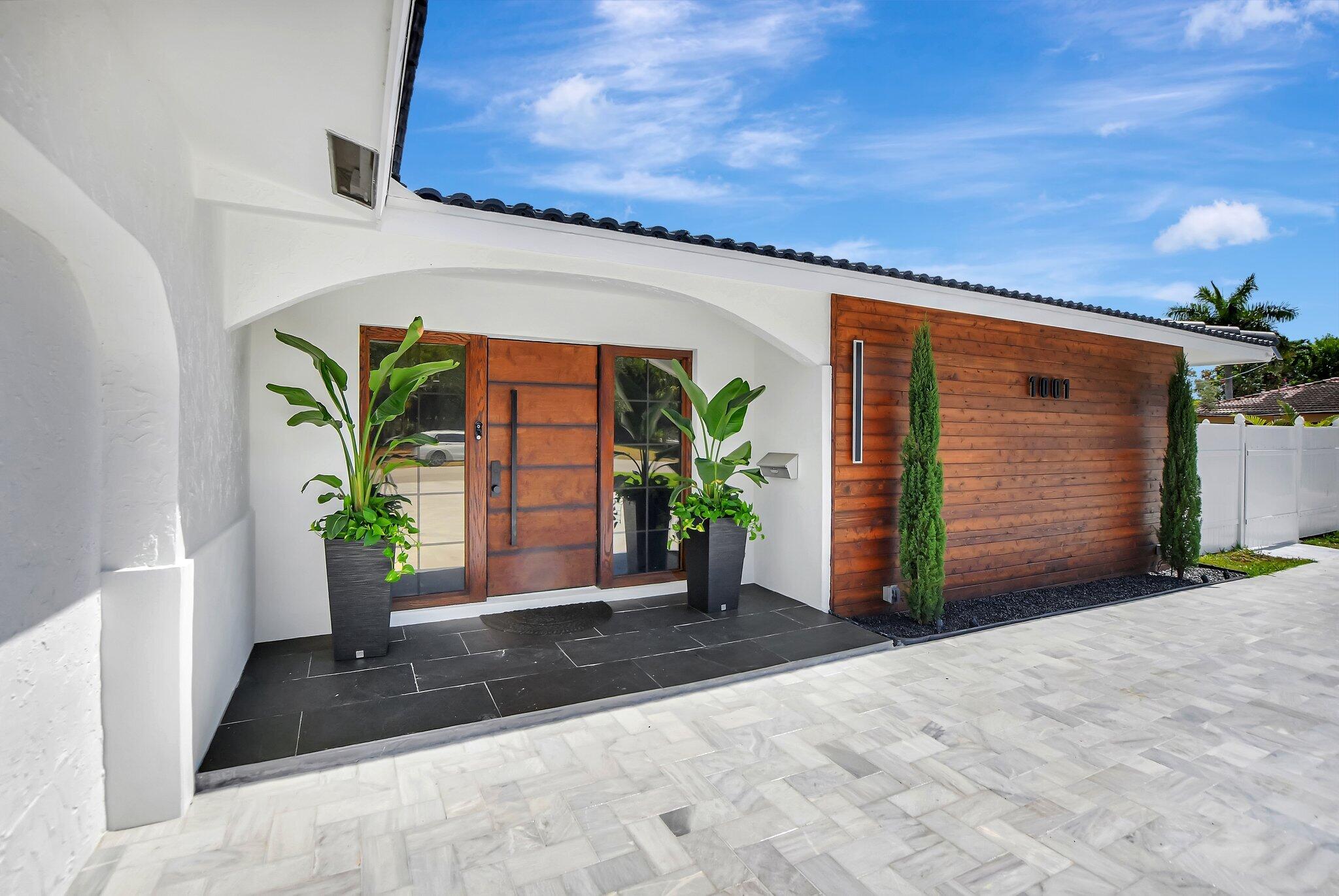 1001 West Palmetto Park Road Boca Raton, FL 33486 - Photo 36 of 48 Custom Cedar Panels and Front Door