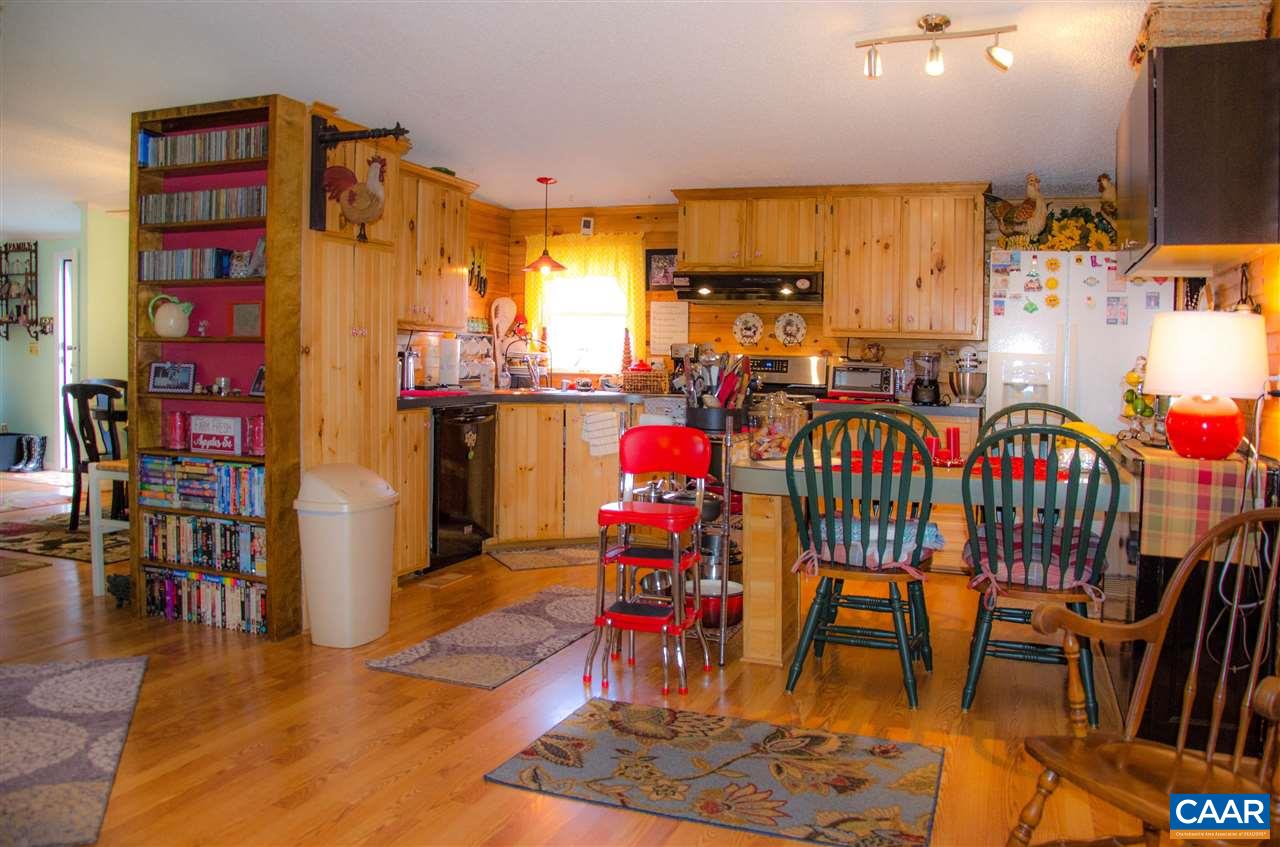 3919 Firehouse Road Howardsville, VA 24562 - Photo 12 of 49 a view of a dining room with furniture