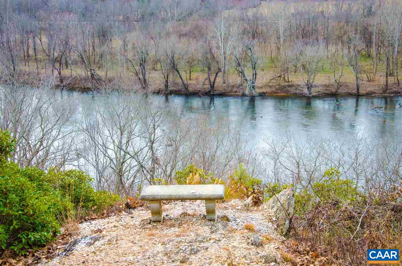 3919 Firehouse Road Howardsville, VA 24562 - Photo 2 of 49 a view of a lake with a big yard