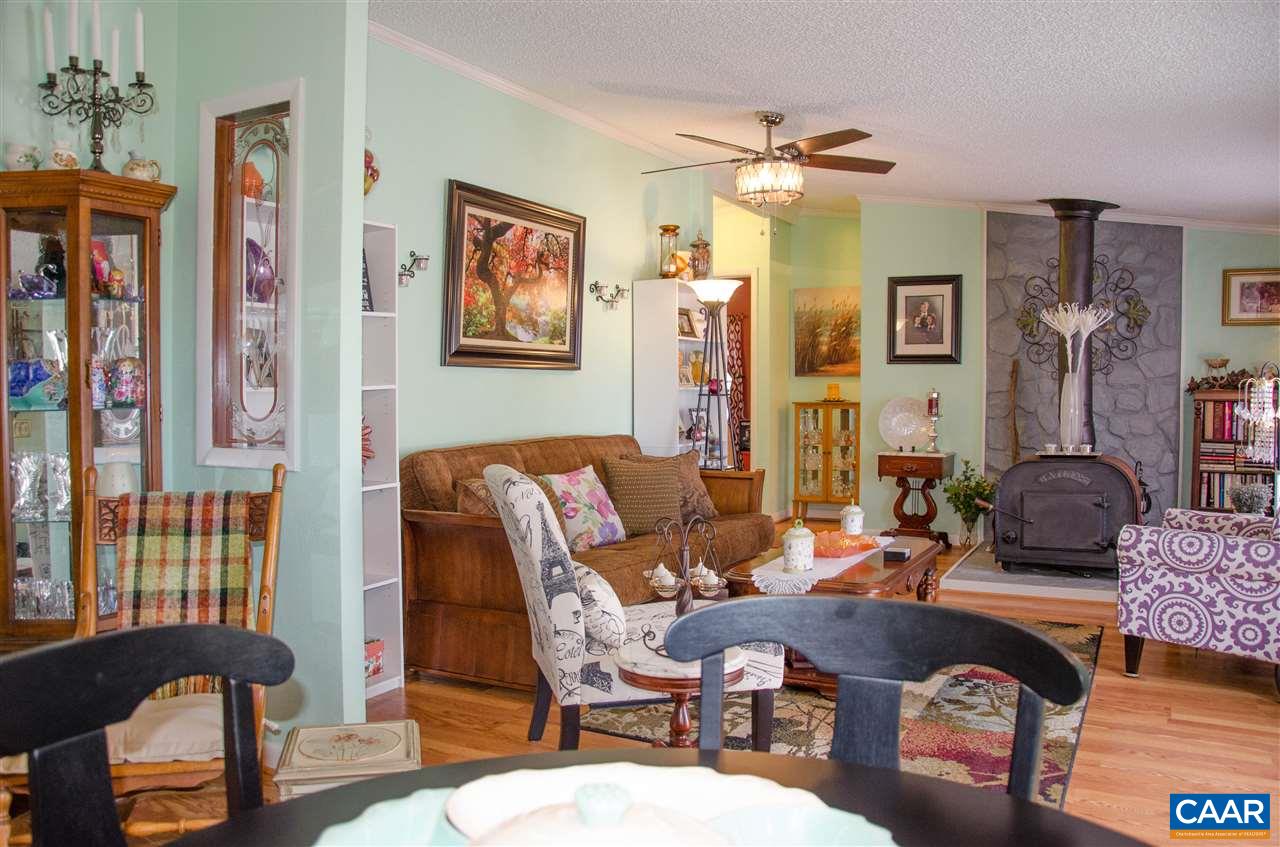 3919 Firehouse Road Howardsville, VA 24562 - Photo 29 of 49 a living room with furniture and a window