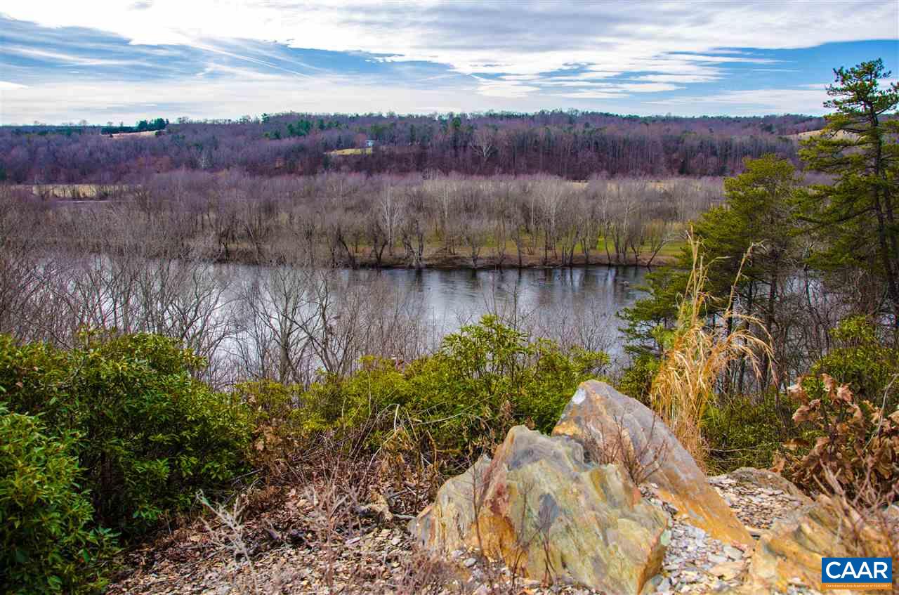 3919 Firehouse Road Howardsville, VA 24562 - Photo 39 of 49 a view of a lake with mountain in the background