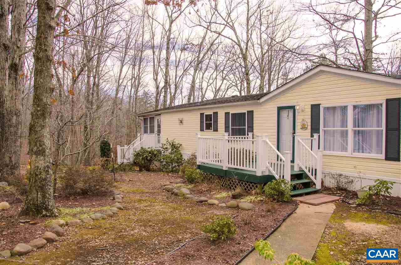 3919 Firehouse Road Howardsville, VA 24562 - Photo 4 of 49 a front view of a house with garden