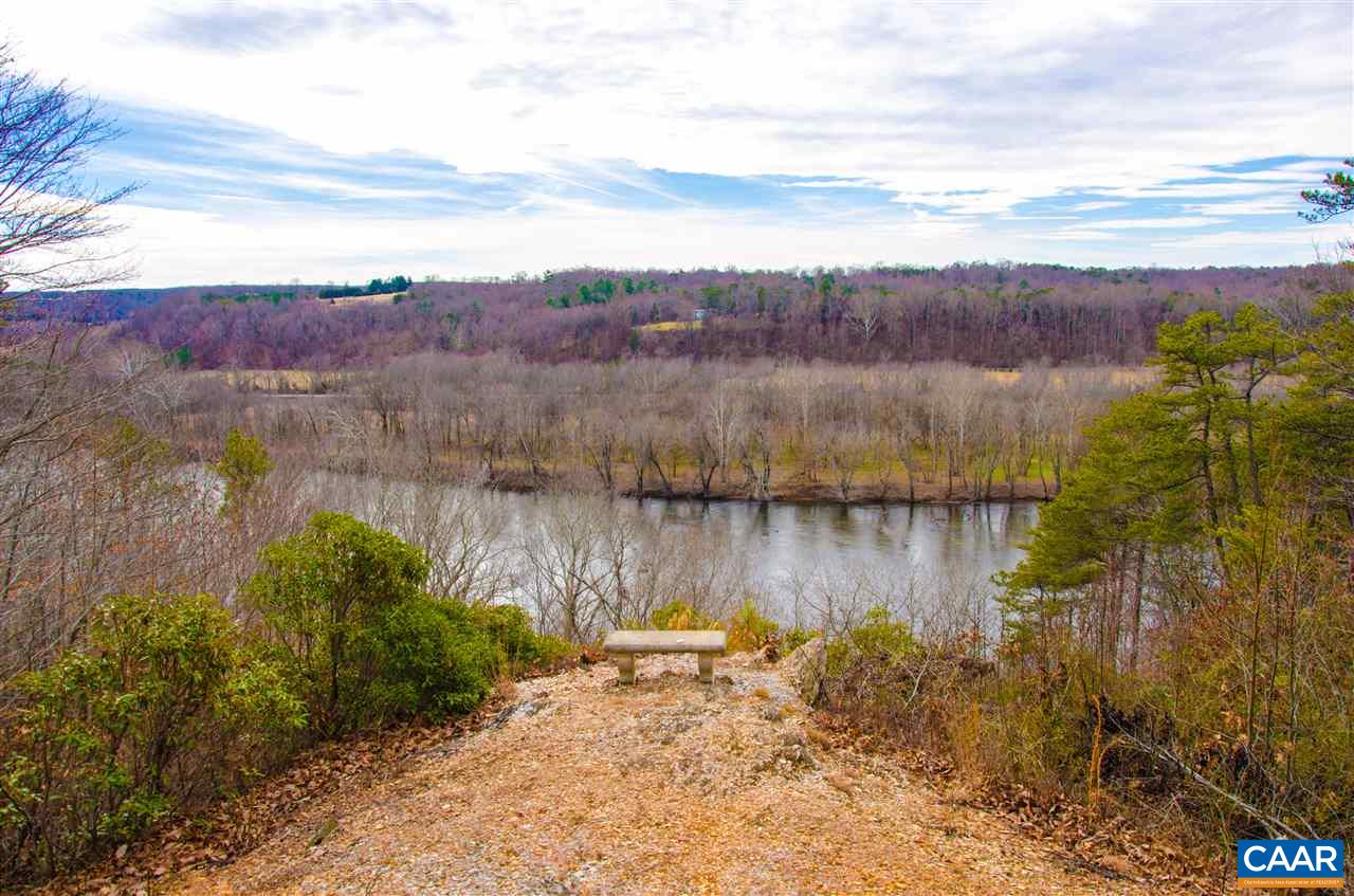 3919 Firehouse Road Howardsville, VA 24562 - Photo 41 of 49 a view of a lake with mountain in the back