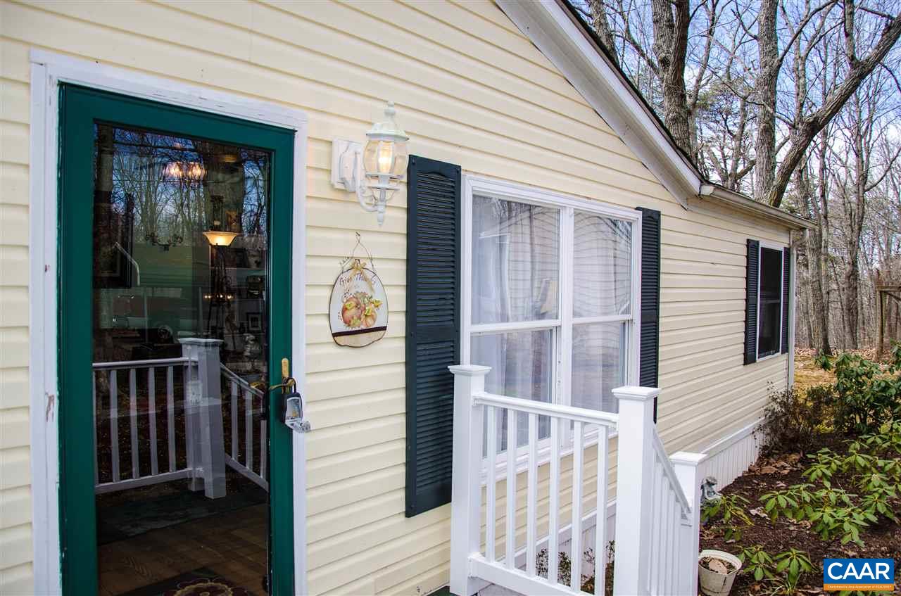 3919 Firehouse Road Howardsville, VA 24562 - Photo 6 of 49 a view of a house with a door and wooden floor