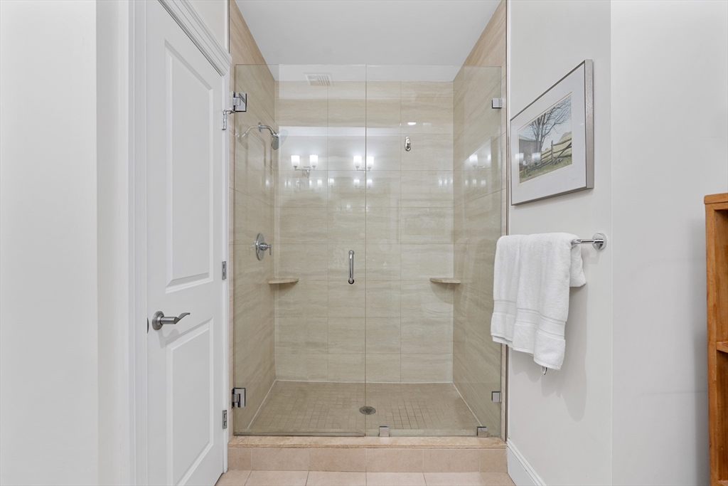 1471 Beacon Street, Unit 1 Brookline, MA 02446 - Photo 12 of 20 a bathroom with a shower