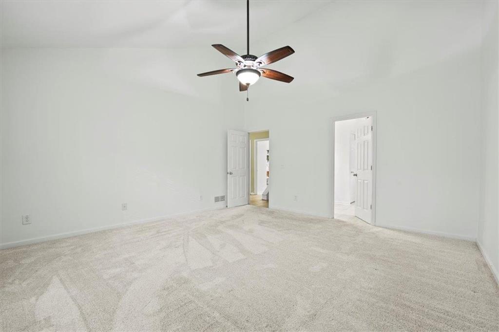 1218 Morgans Run Monroe, GA 30656 - Photo 15 of 39 a view of an empty room with a ceiling fan