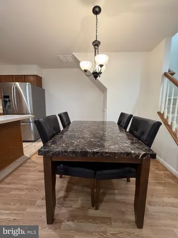 a dining table with wooden floor