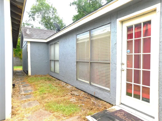 a view of an empty room with a balcony
