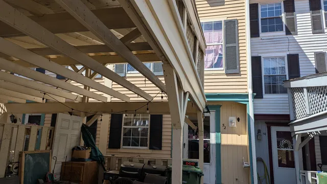 a view of a porch with furniture