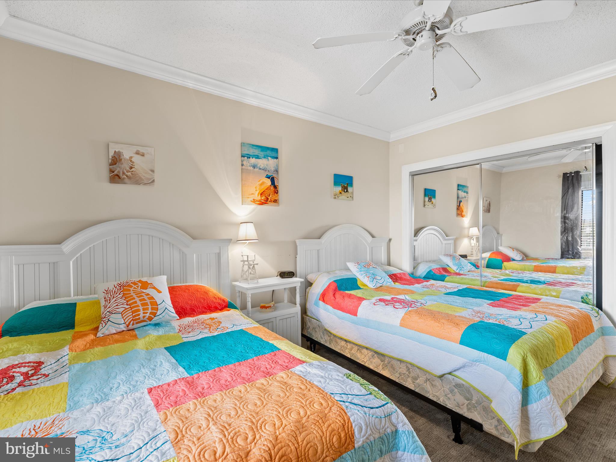 11900 Coastal Highway, Unit 102 Ocean City, MD 21842 - Photo 23 of 39 a bedroom that with bed and window