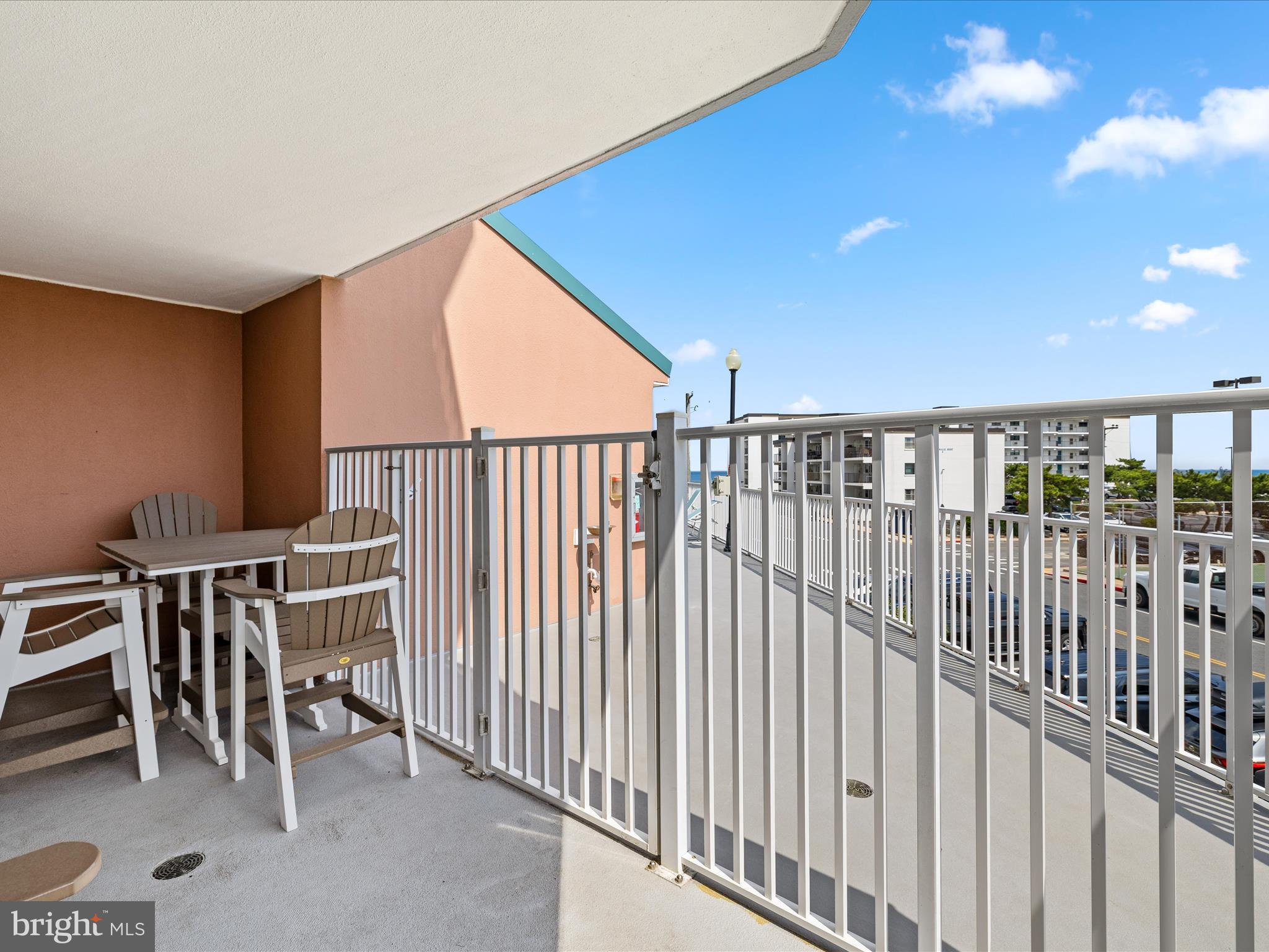 11900 Coastal Highway, Unit 102 Ocean City, MD 21842 - Photo 31 of 39 a view of balcony with furniture