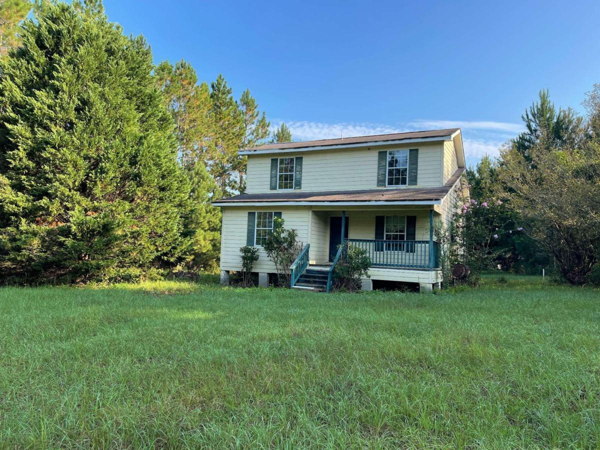 1925 Post Road Hazlehurst, GA 31539 - Photo 1 of 1 a view of a house with a yard