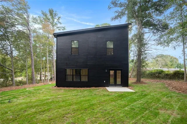 front view of a house with a yard