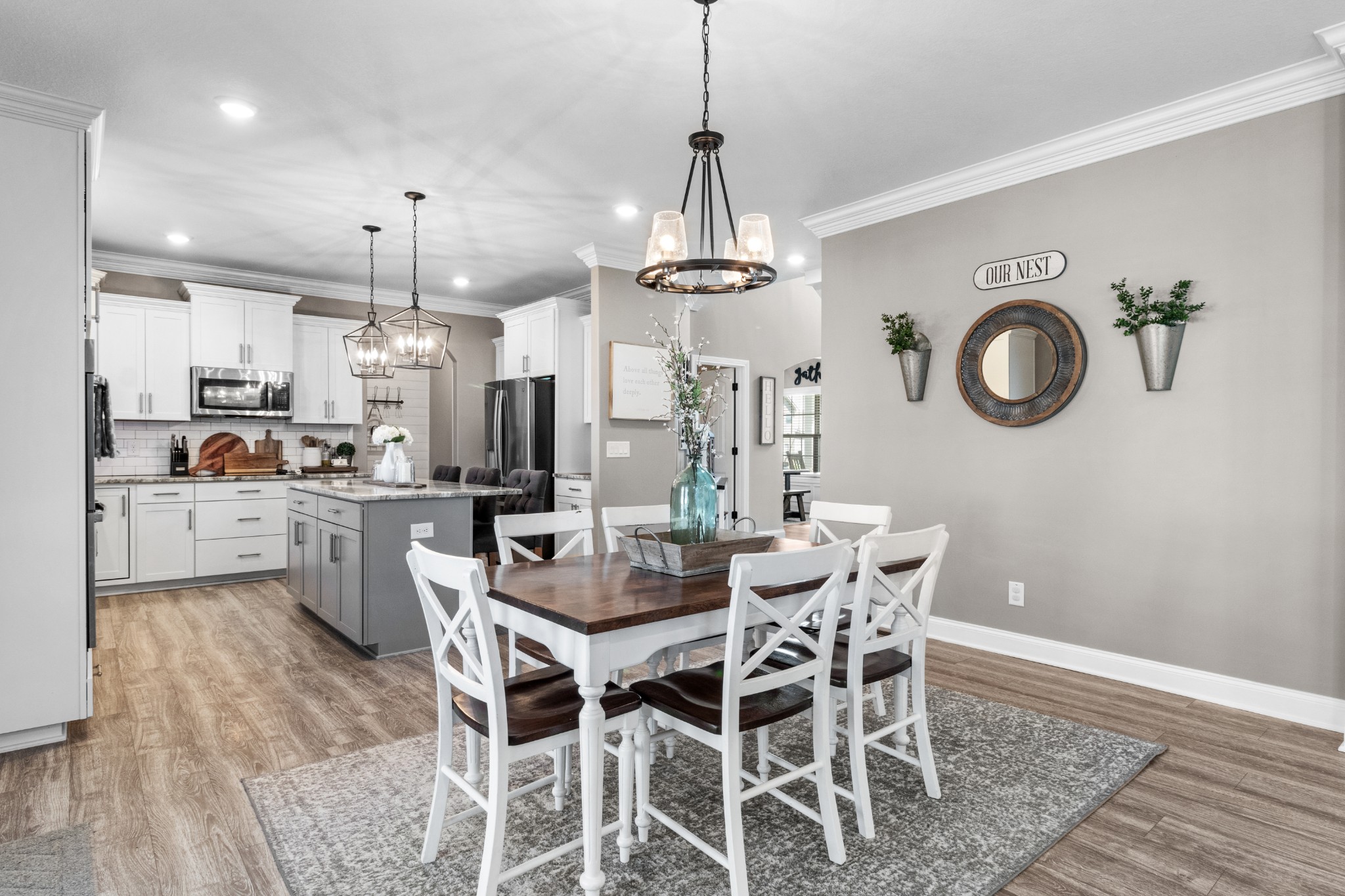 532 Bowden Drive Clarksville, TN 37043 - Photo 16 of 47 a kitchen with stainless steel appliances granite countertop a kitchen island a stove a table and chairs