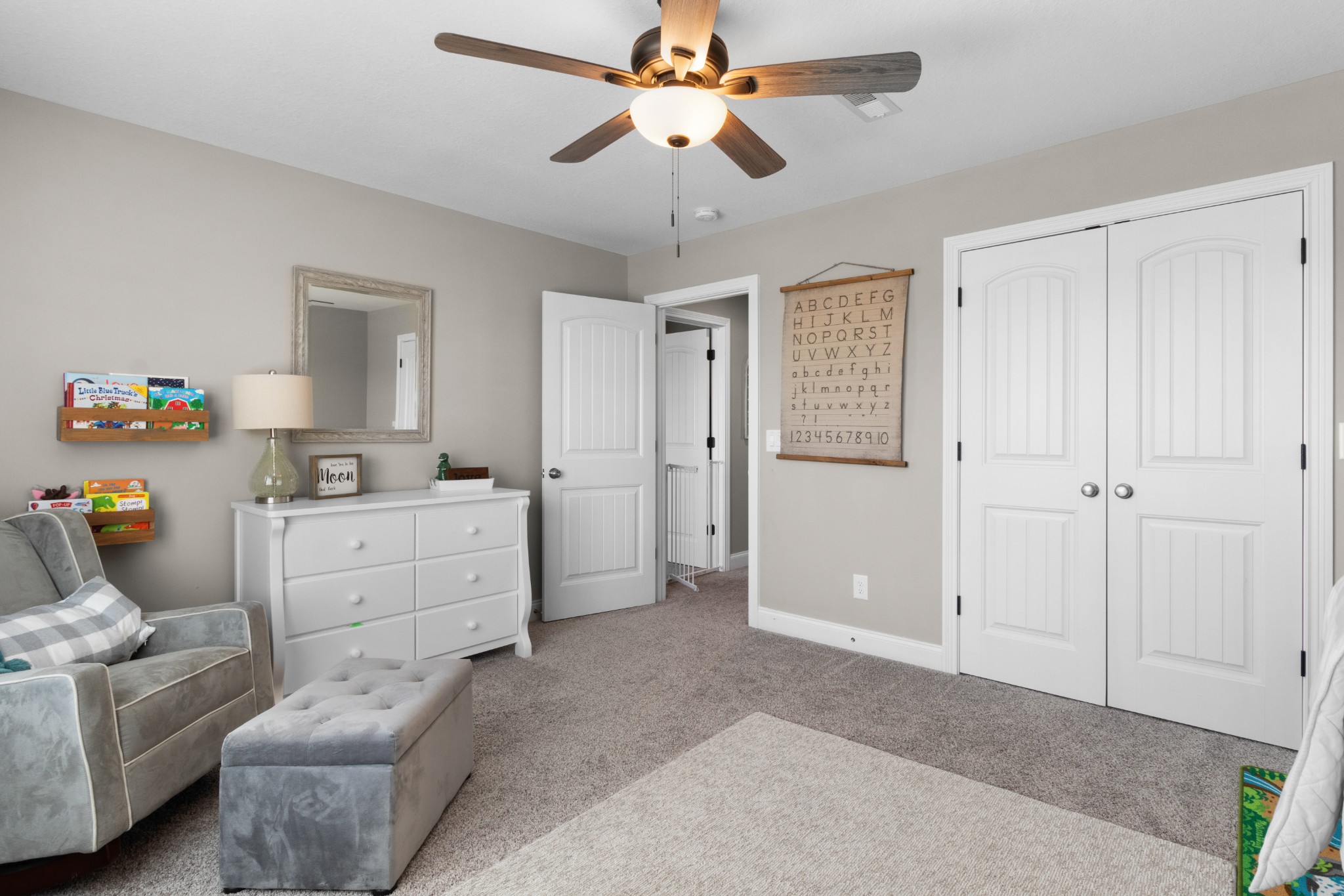 532 Bowden Drive Clarksville, TN 37043 - Photo 31 of 47 a room with furniture a ceiling fan and a window