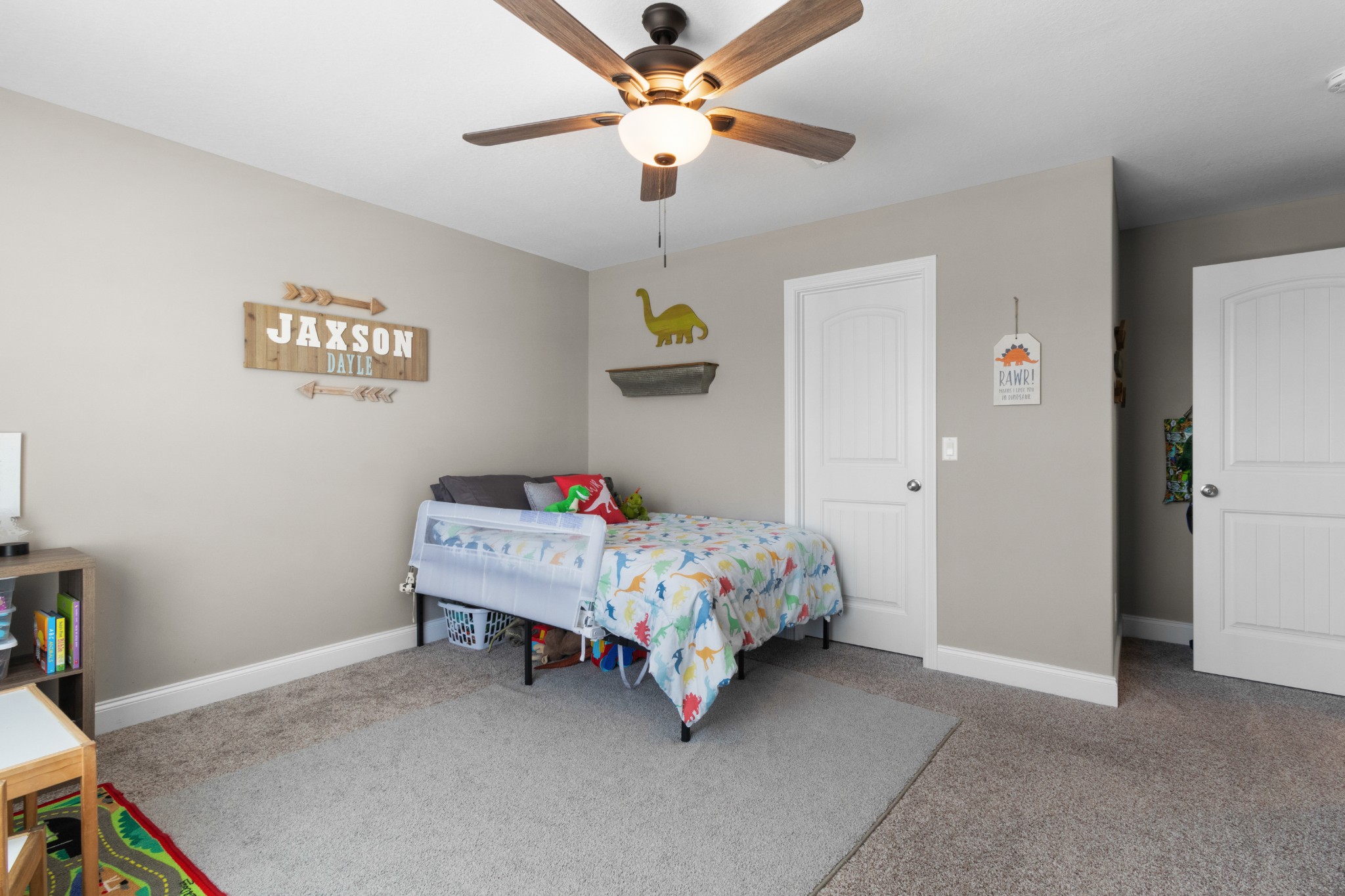 532 Bowden Drive Clarksville, TN 37043 - Photo 33 of 47 a bedroom with a bed and a chandelier