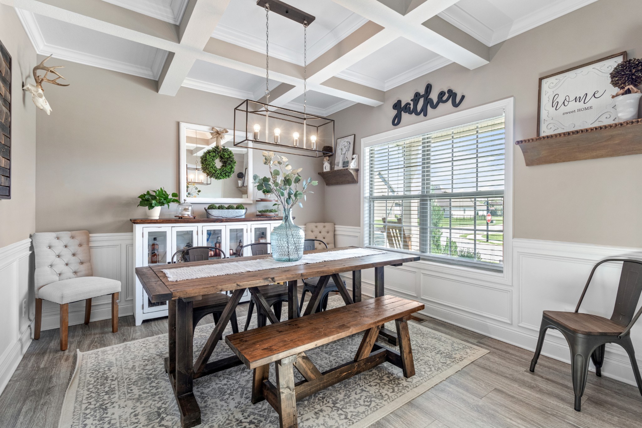 532 Bowden Drive Clarksville, TN 37043 - Photo 6 of 47 a dining room with furniture a rug and wooden floor