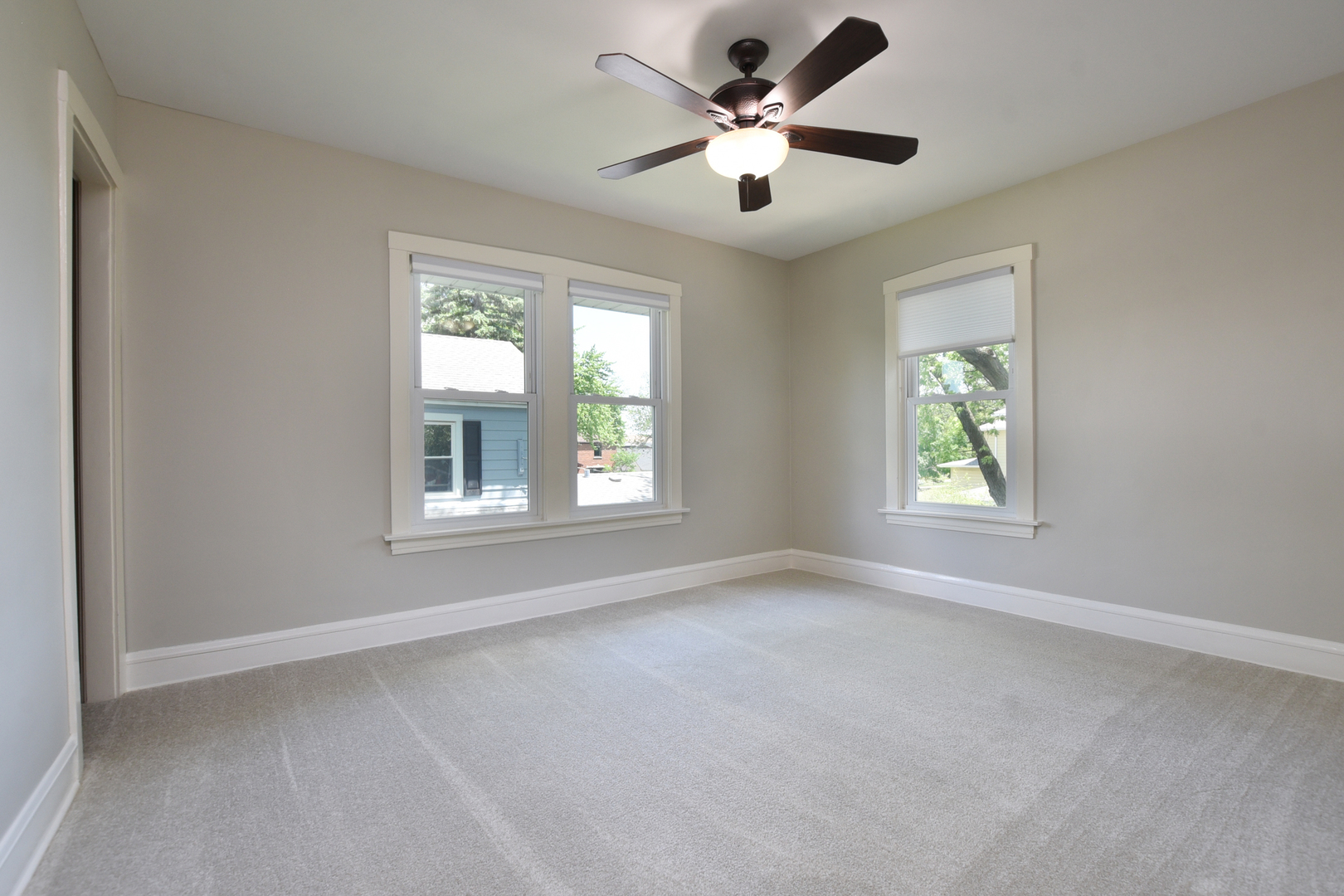 347 Herrick Road Riverside, IL 60546 - Photo 15 of 28 an empty room with a window and a fan
