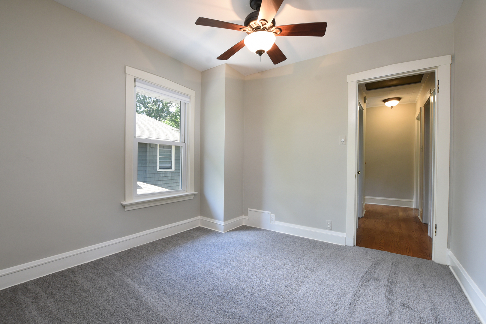 347 Herrick Road Riverside, IL 60546 - Photo 19 of 28 an empty room with windows and fan