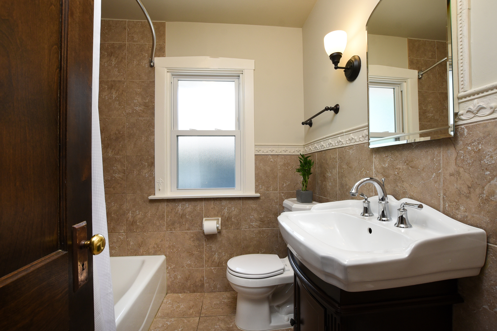 347 Herrick Road Riverside, IL 60546 - Photo 20 of 28 a bathroom with a sink a toilet and shower