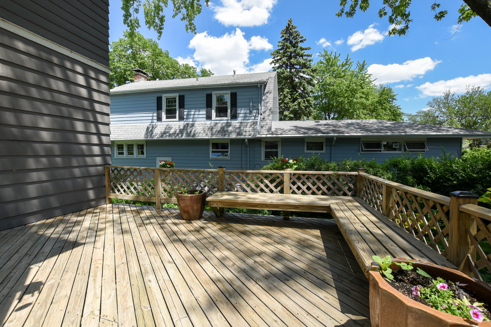 347 Herrick Road Riverside, IL 60546 - Photo 22 of 28 a balcony with wooden floor and fence