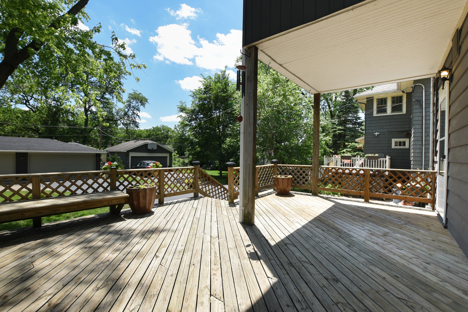 347 Herrick Road Riverside, IL 60546 - Photo 23 of 28 a view of a deck with chairs and wooden floor