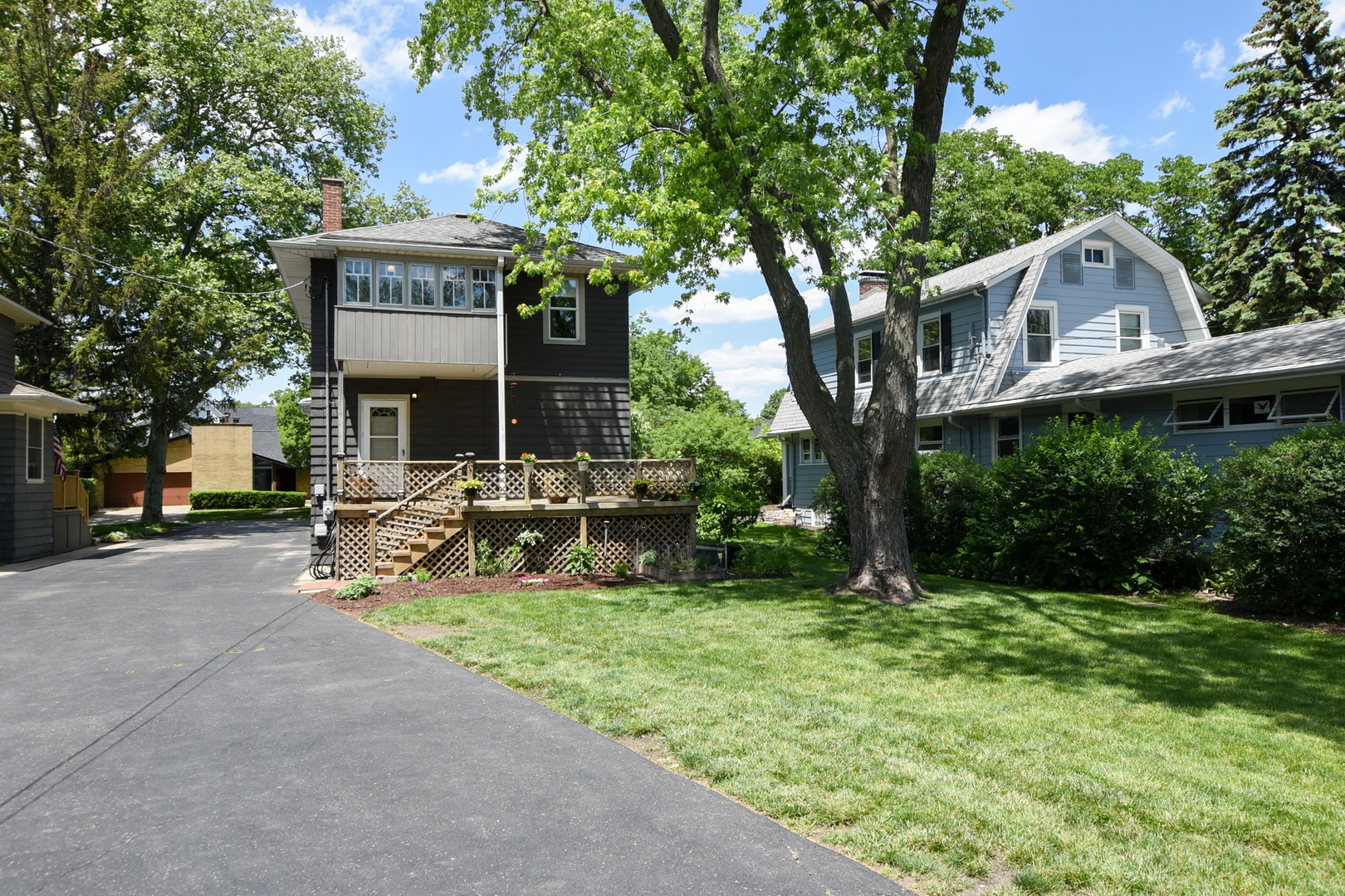 347 Herrick Road Riverside, IL 60546 - Photo 25 of 28 a view of a house with backyard and sitting area