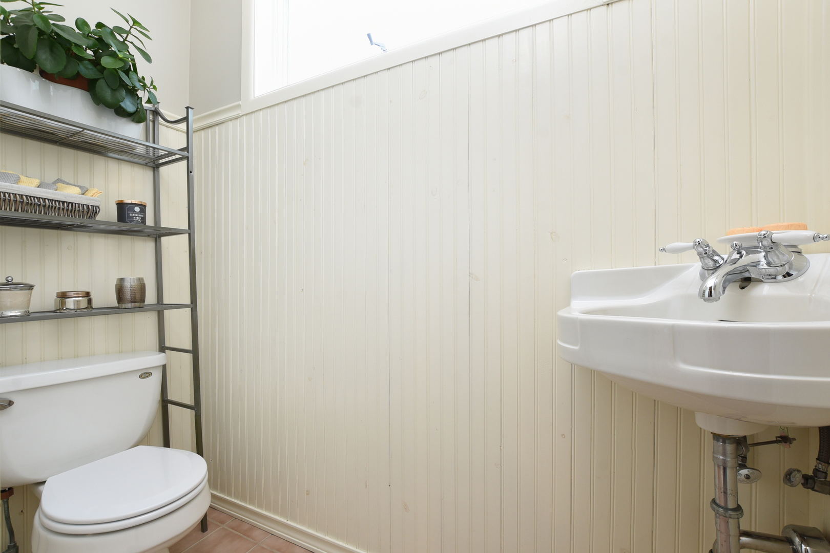 347 Herrick Road Riverside, IL 60546 - Photo 6 of 28 a bathroom with a sink a toilet and a mirror