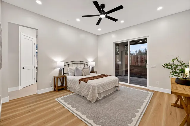 a bathroom with a glass shower door