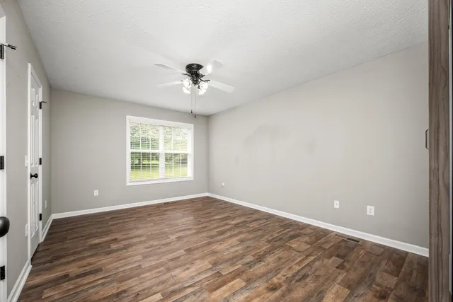 an empty room with windows