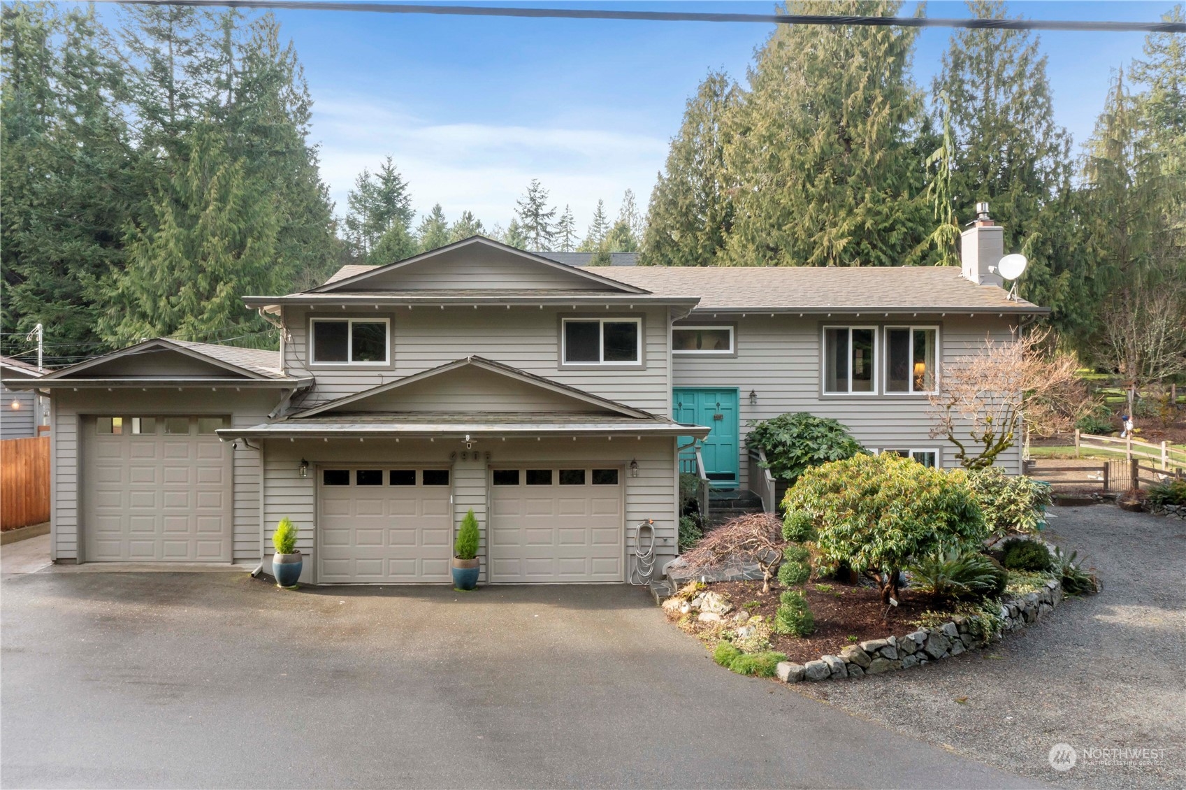 4906 200th Street Southeast Bothell, WA 98012 - Photo 1 of 40 front view of a house with a street